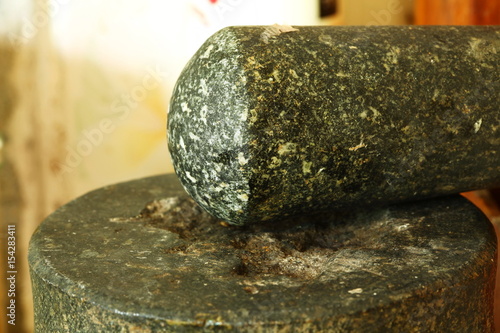 Old stone mortar put in the kitchen scene.