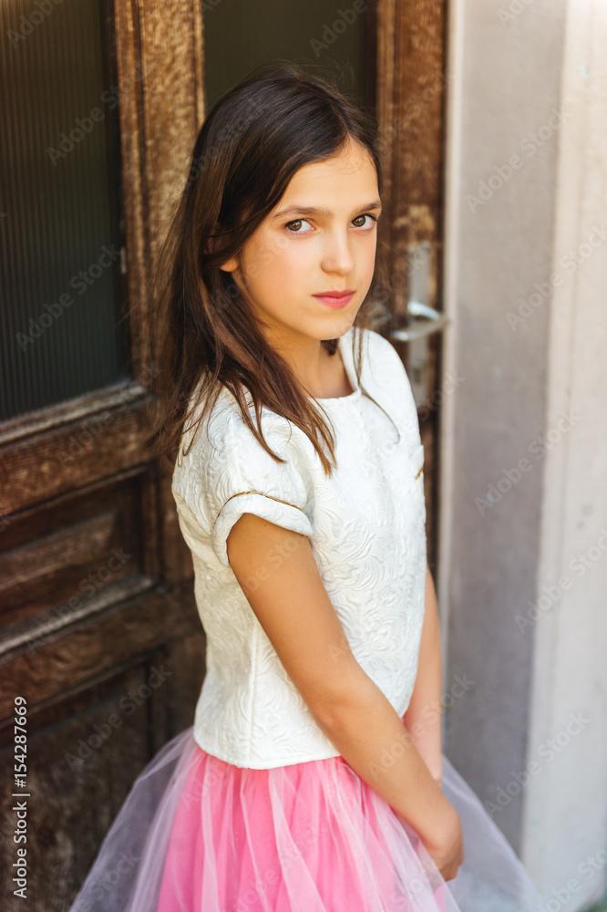 Preteen girl with teeth braces wearing beautiful dress Preteen girl with teeth braces wearing beautiful dress