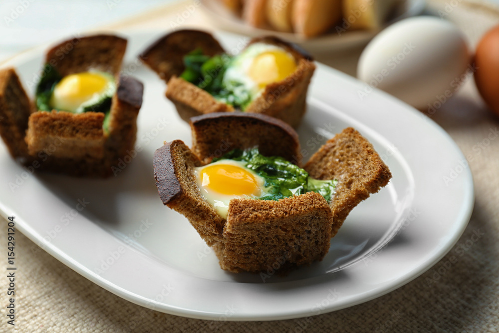 Plate with tasty eggs and spinach, closeup Plate with tasty eggs and spinach, closeup