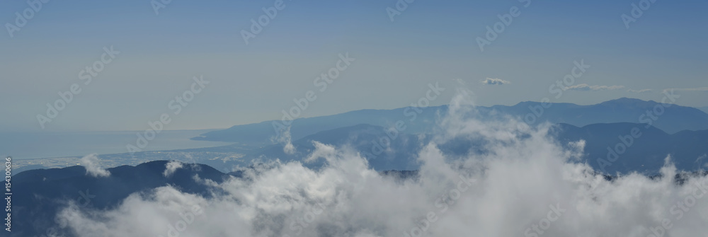 Clouds, mountains and coast