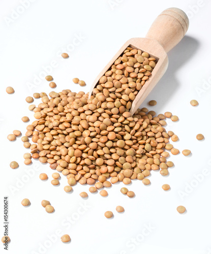 uncooked lentils on white, (large depth of field, taken with tilt shift lens)