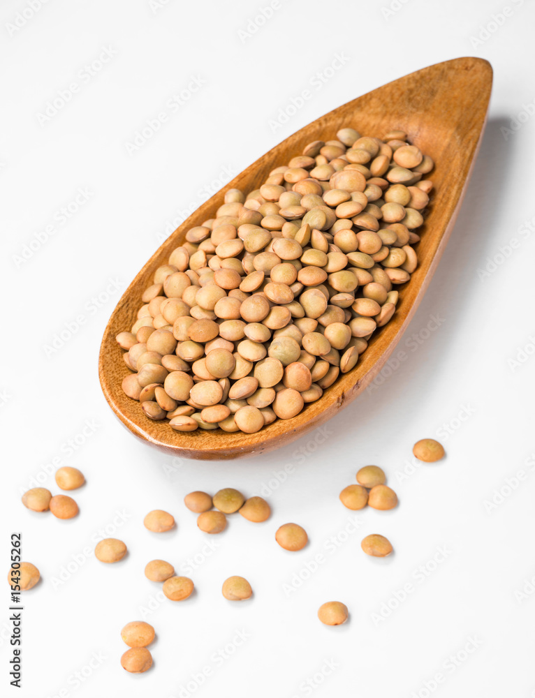 uncooked lentils on white, (large depth of field, taken with tilt shift lens) uncooked lentils on white, (large depth of field, taken with tilt shift lens)