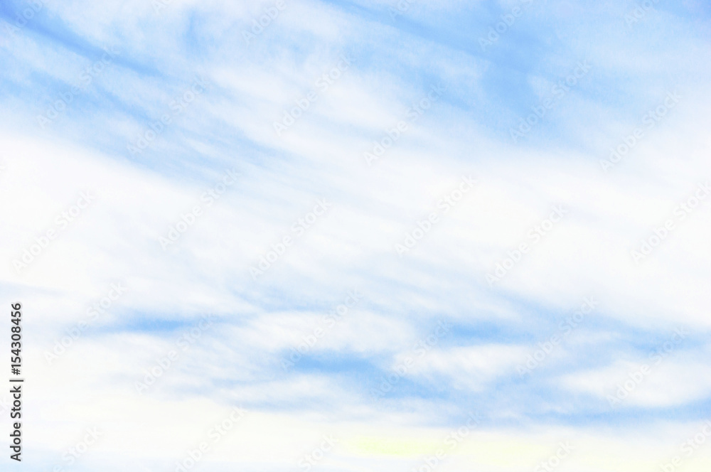 Fototapeta premium Bright summer sky with beautiful clouds. Light blue sky with snow-white clouds.