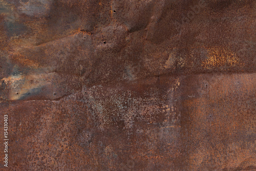 Old rusty crumpled metal sheet texture photo