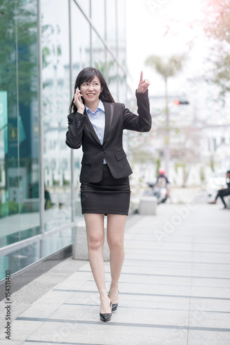 businesswoman talk on phone © ryanking999