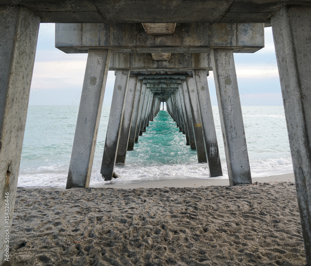 The underside of one of the many fishing piers on the Gulf of Mexico.