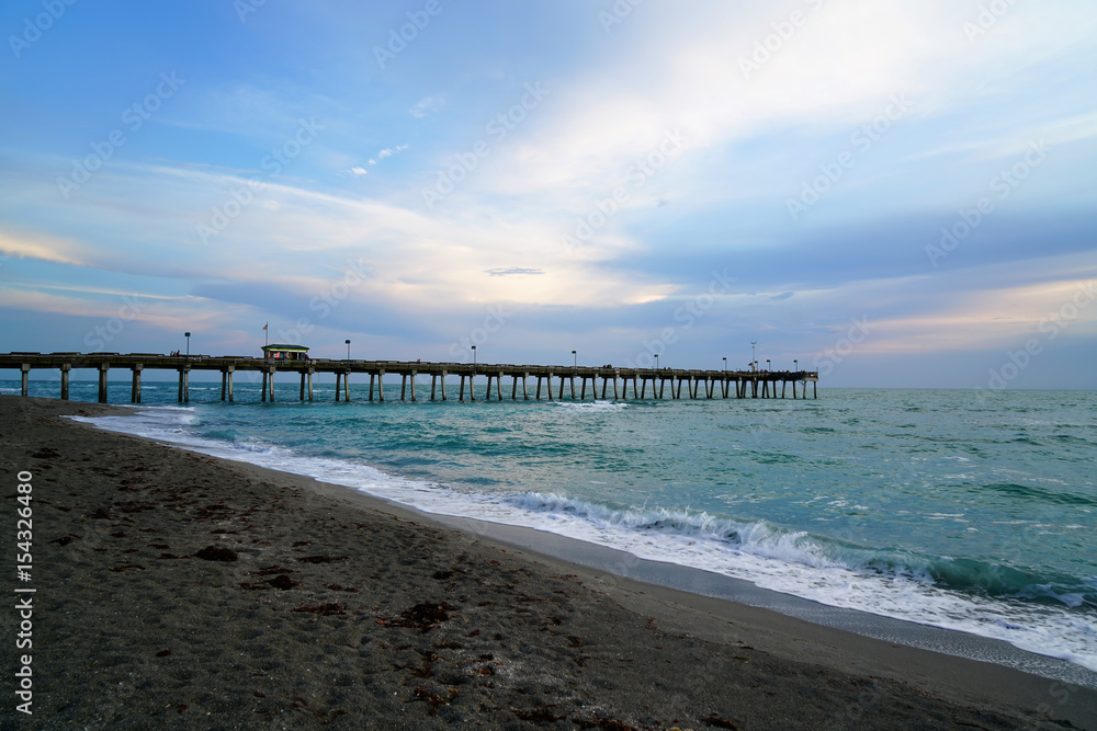 The fishing pier at Sharky's restaurant in Venice Florida that jets out into the Gulf of Mexico.