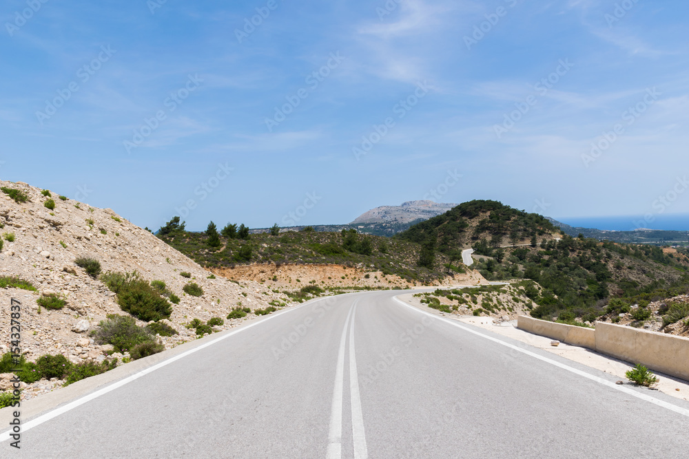 Roadtrip in Greece with beautiful landscape and blue sky.