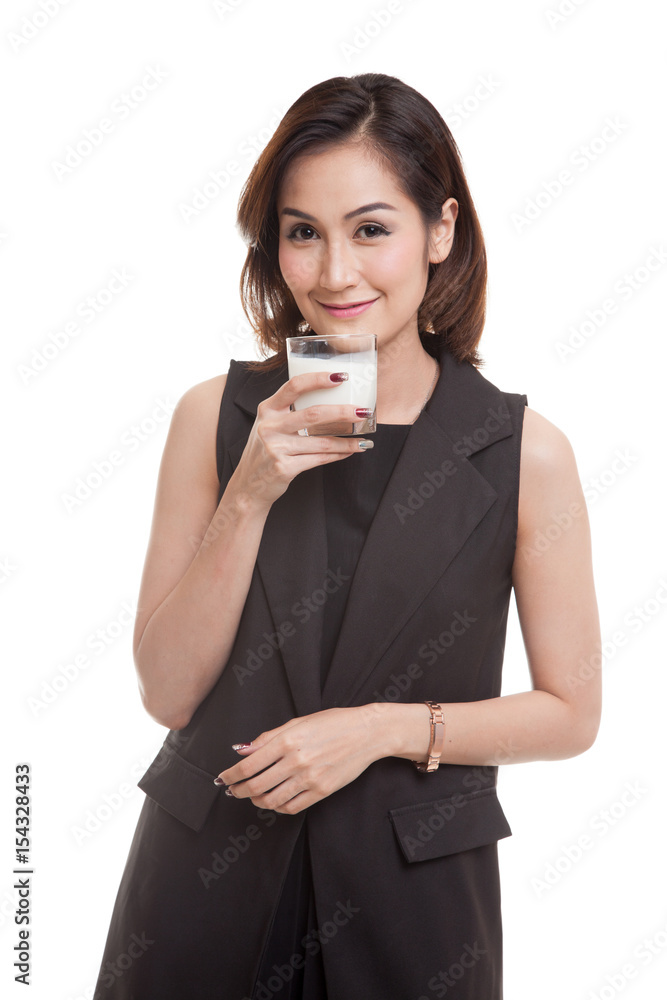 Healthy Asian woman drinking a glass of milk. Healthy Asian woman drinking a glass of milk.