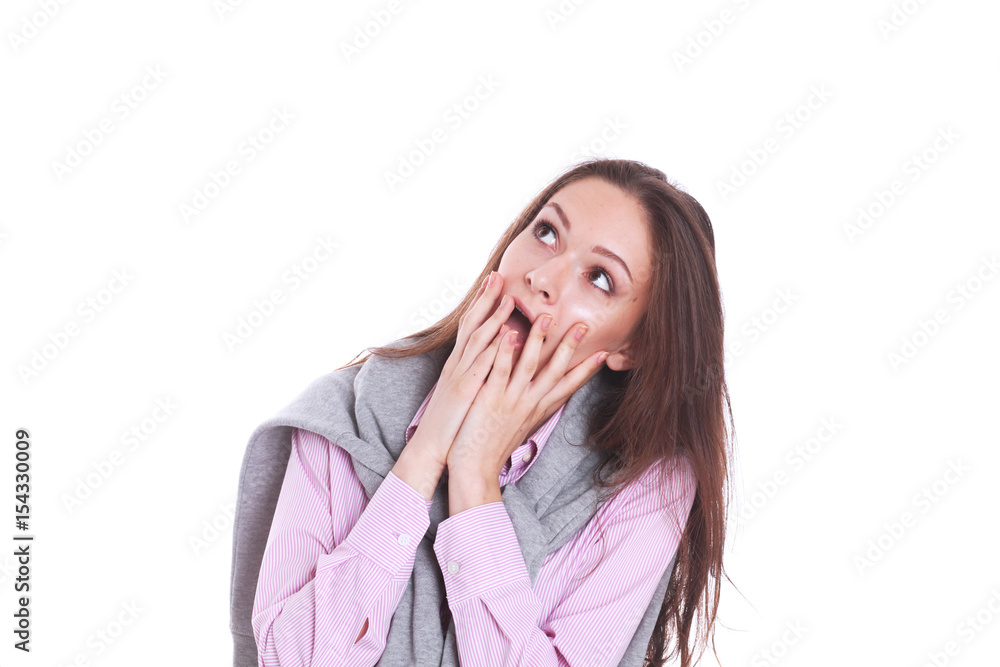 Young woman standing on the white background Young woman standing on the white background