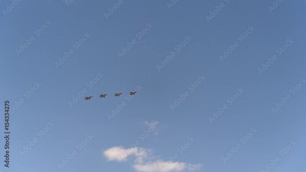 Four fighters Mig-31 fly in blue sky Four fighters Mig-31 fly in blue sky