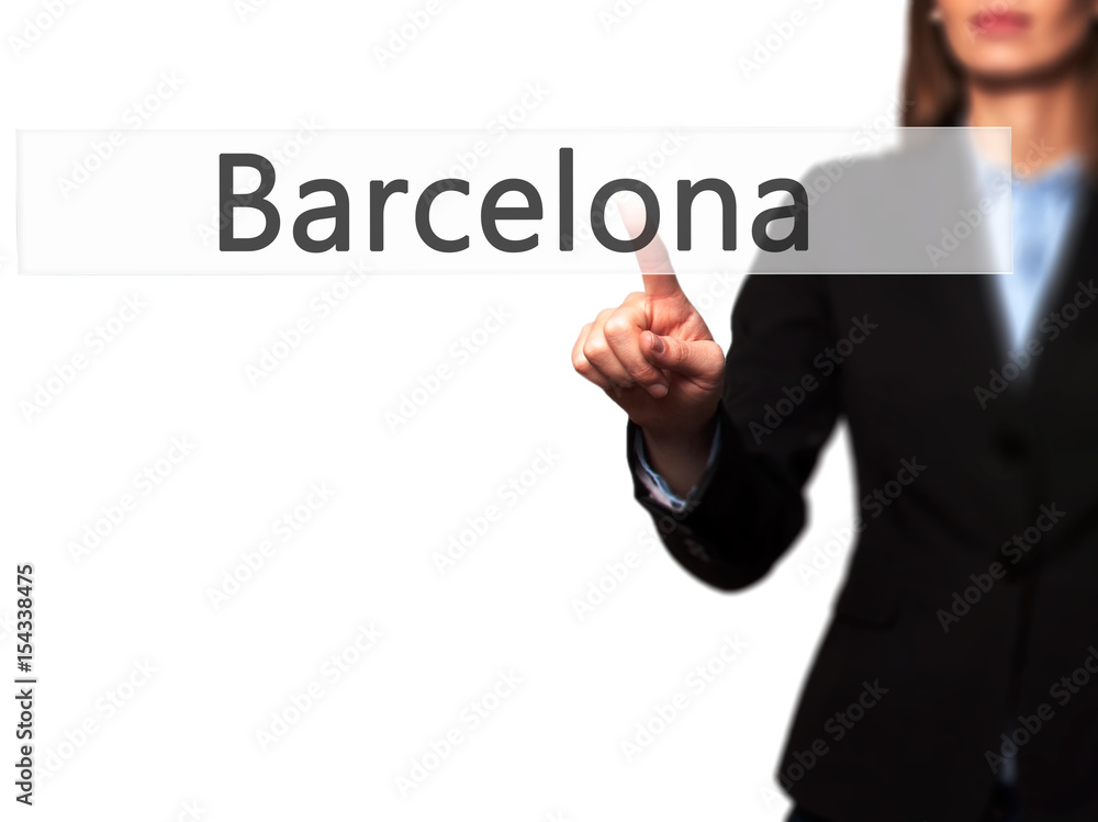 Barcelona - Female touching virtual button. Barcelona - Female touching virtual button.