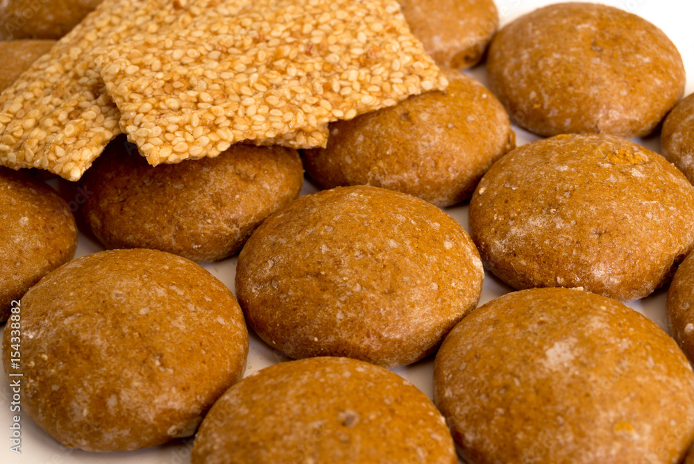 Biscuits and sweet bars with honey and sesame seeds Biscuits and sweet bars with honey and sesame seeds