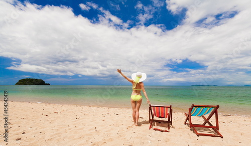 Fototapeta Naklejka Na Ścianę i Meble -  Thailand. Woman sea, bikini, hat, tan, sunbed. Libong