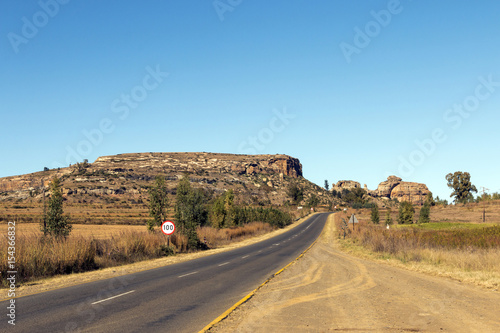Empty Rural Asphalt Road Running Through Dry Winter Landscape