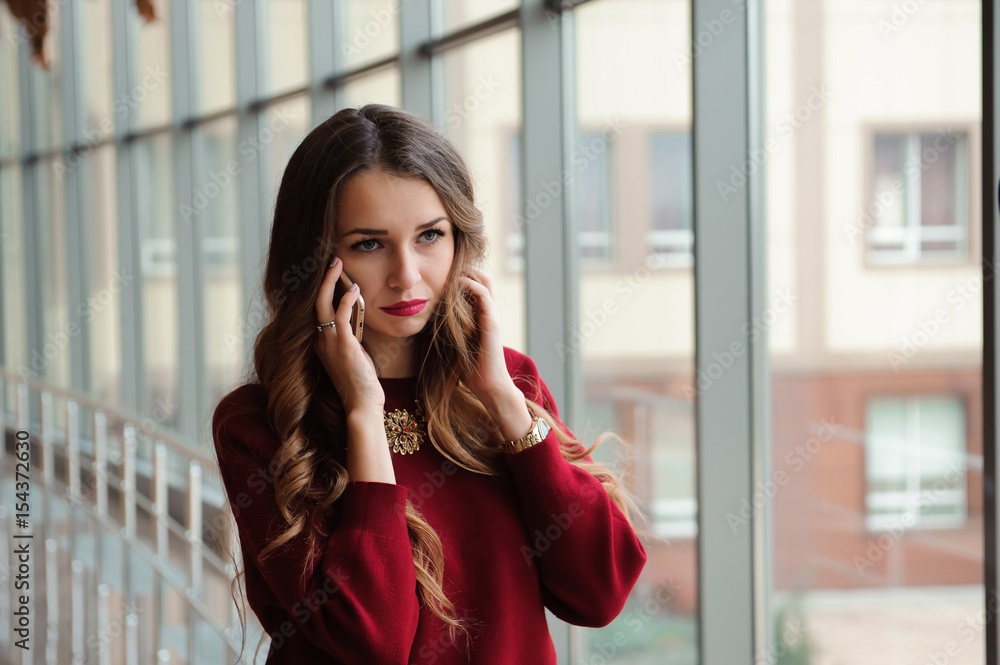 Young businesswoman with mobilephone. Young businesswoman with mobilephone.