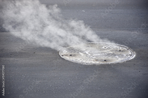 Manhole Cover with Steam Escaping