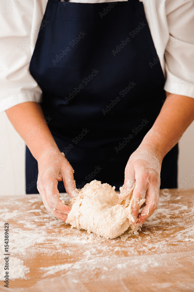 Chef preparing dough - cooking process Chef preparing dough - cooking process