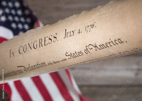 Declaration of Independence With the American Flag in Background