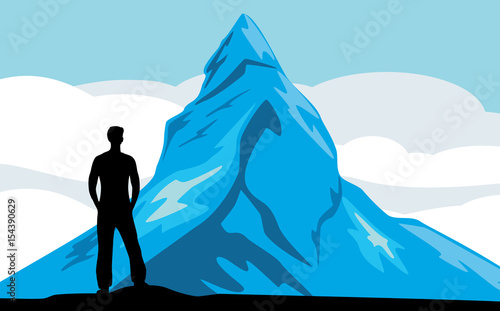 Male silhouette on the mountain background