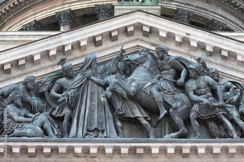 Fragment of the eastern pediment of St. Isaac's Cathedral - Isaac Dalmatsky stops Emperor Valenta photo