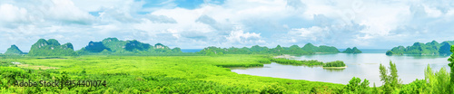 Panorama, coastal scenery with mangroves, mountains, bays and the sea from a high angle location at Pathiu District, Chumphon, Thailand