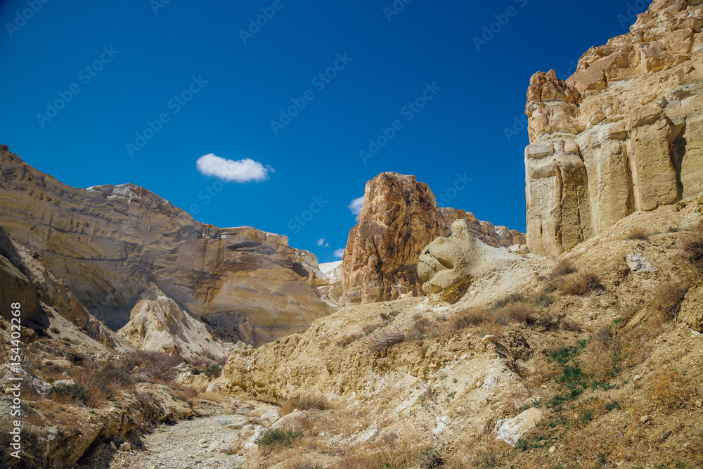 Peaked rocks in the canyon of Boszhira, chines Plateau Ustyurt, Kazakhstan Peaked rocks in the canyon of Boszhira, chines Plateau Ustyurt, Kazakhstan