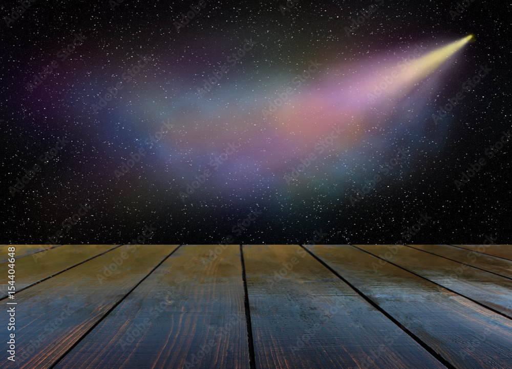 Fototapeta premium Comet flies in the darkness of outer space