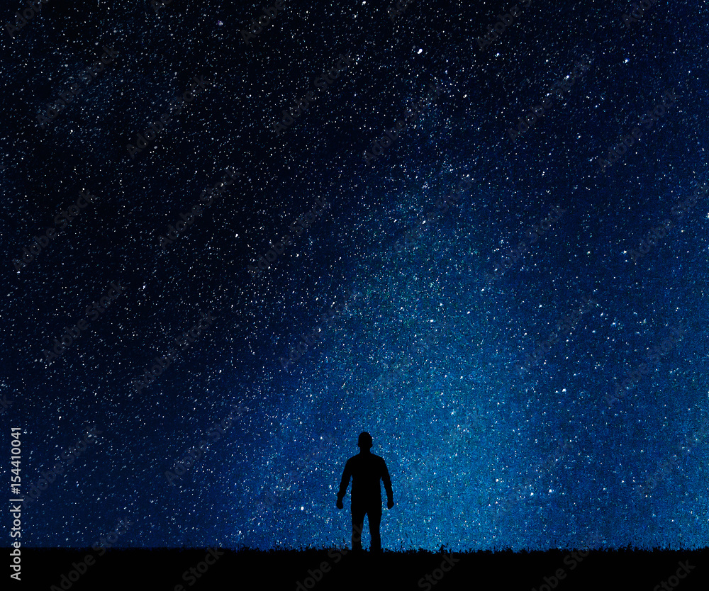 Silhouette of man on a background  stars.