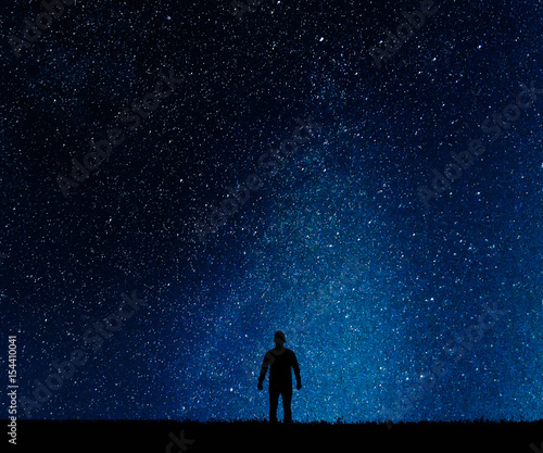 Silhouette of man on a background stars.