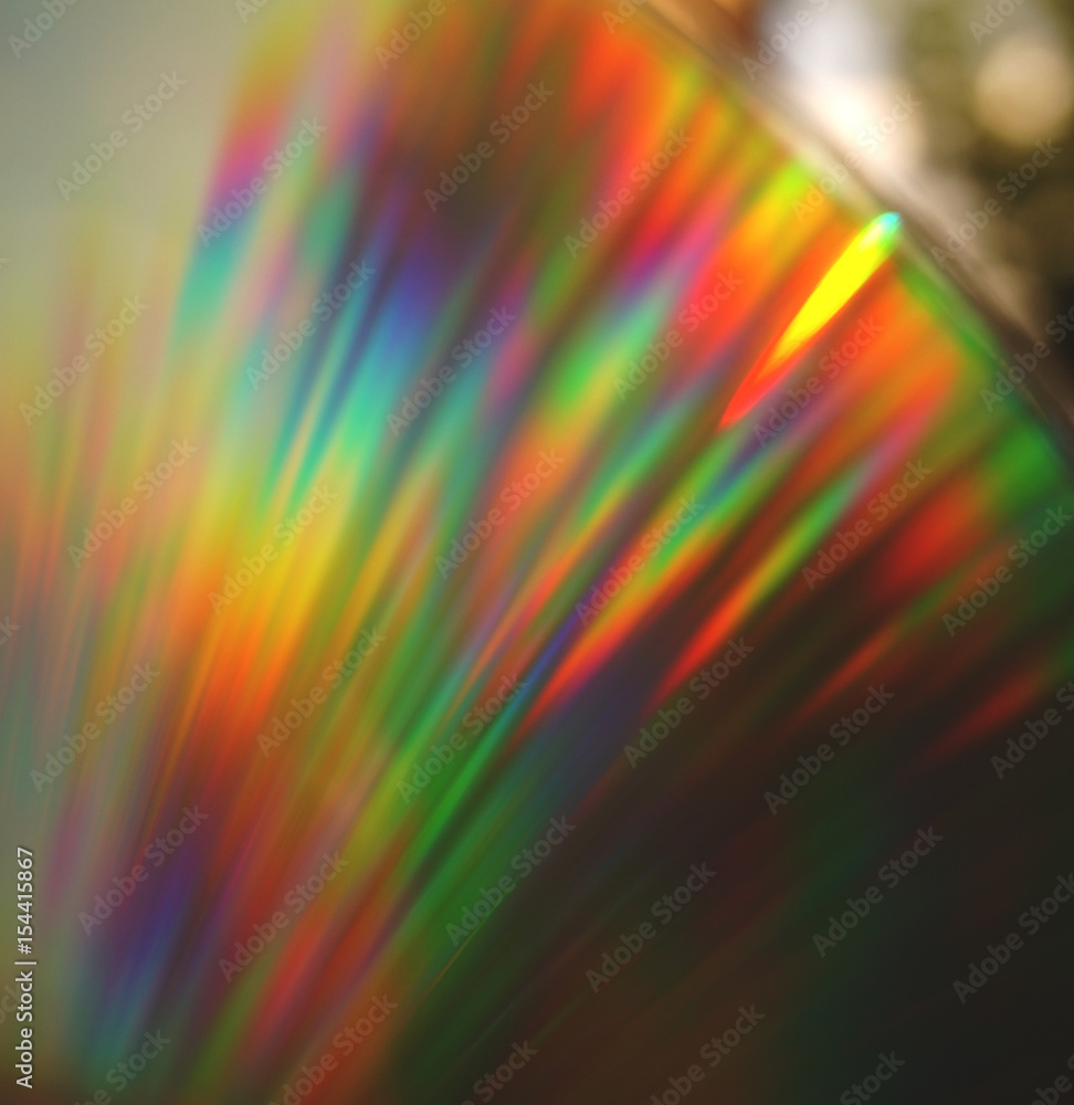 Colorful abstract background. Rainbow light reflection on CD. Stock Photo
