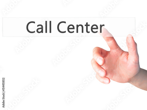Call Center - Hand pressing a button on blurred background concept on visual screen.