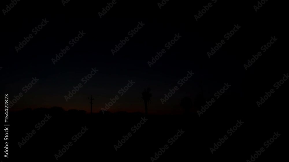 Timelapse of sunrise, landscape, palmtrees, red sky, Pantanal Timelapse of sunrise, landscape, palmtrees, red sky, Pantanal