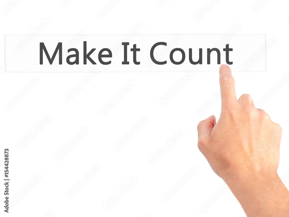 Make It Count - Hand pressing a button on blurred background concept on visual screen. Make It Count - Hand pressing a button on blurred background concept on visual screen.
