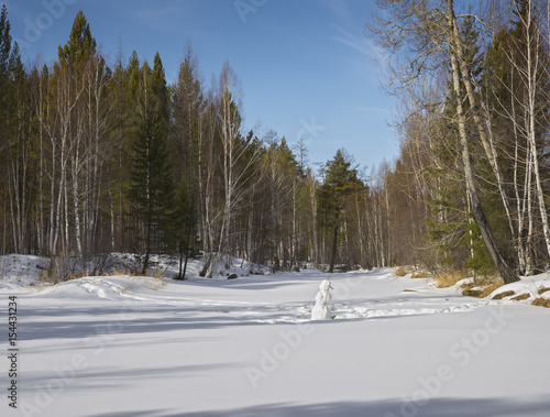 Snowman on the river Olkha photo