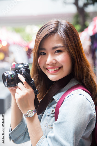 Young asian lady travel in city center