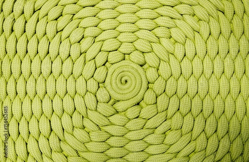 Green woven cord texture background