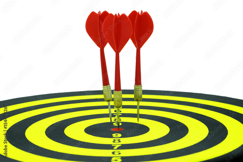 Three red dart arrow hitting in the target center of darts board on white isolated with clipping path. Three red dart arrow hitting in the target center of darts board on white isolated with clipping path.