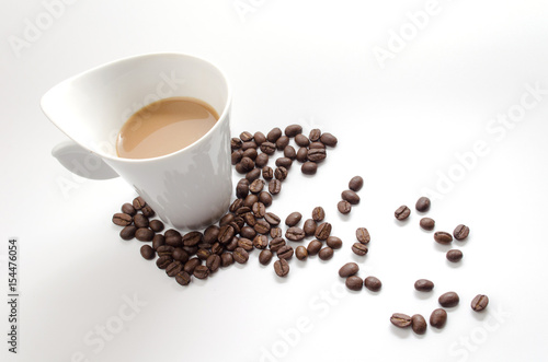 coffee beans and white coffee cup isolated on white background