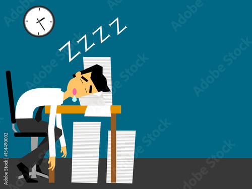 Business man sleeping at his office desk