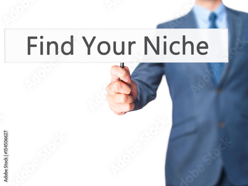 Find Your Niche - Businessman hand holding sign