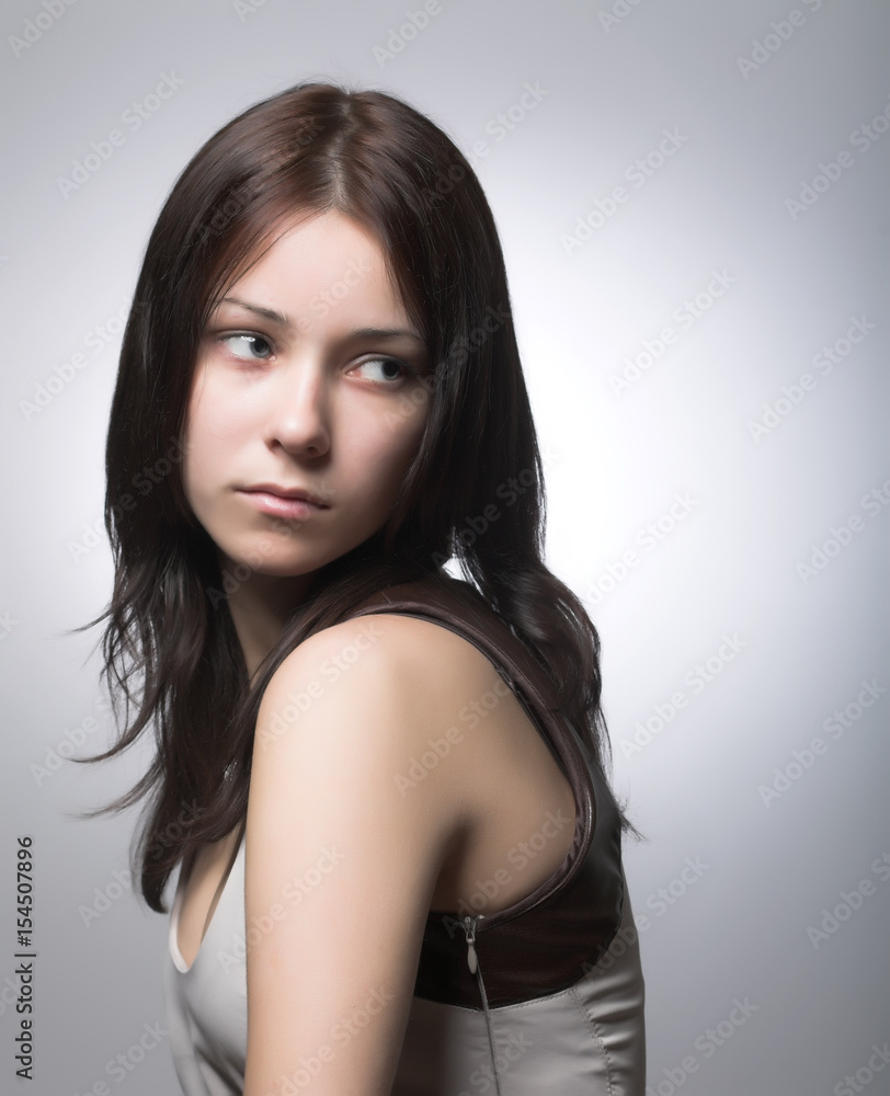 Fashion girl posing in studio Fashion girl posing in studio