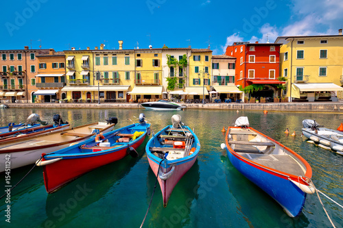 Lazise colorful harbor and boats view