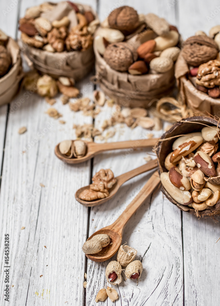 different nuts in plates different nuts in plates