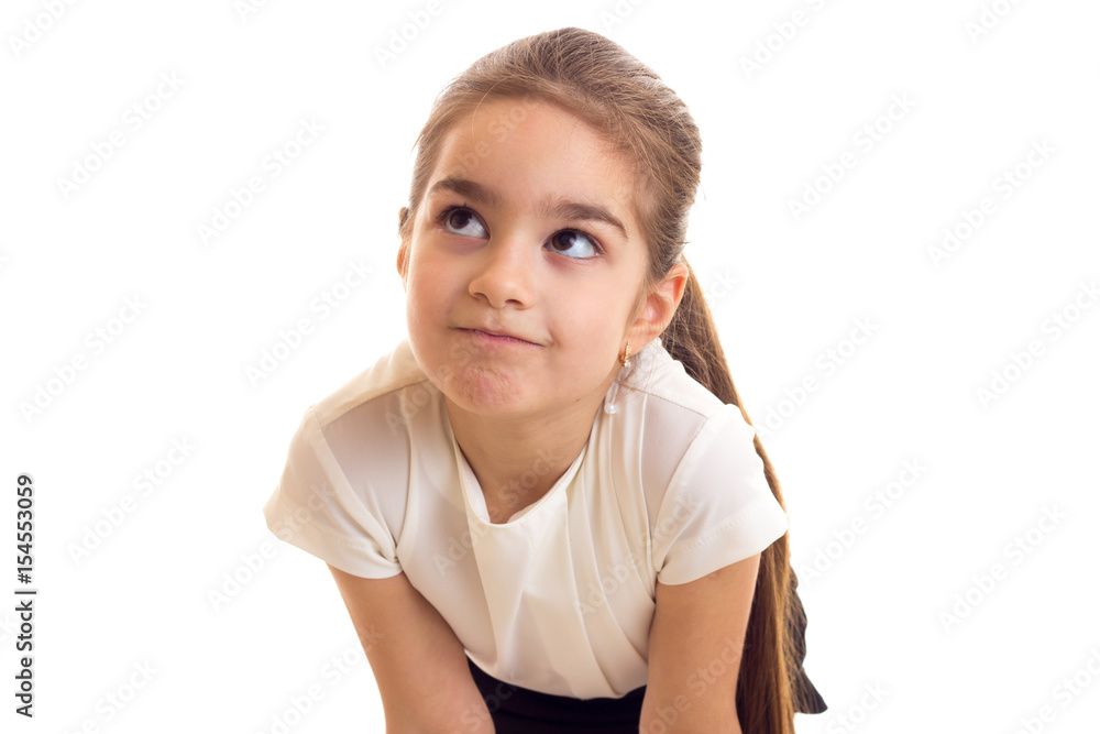 Little girl in white T-shirt and black skirt Little girl in white T-shirt and black skirt