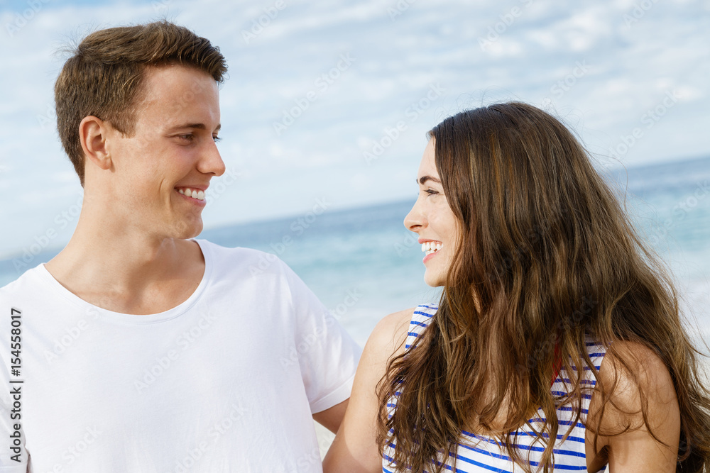Romantic young couple on the beach Romantic young couple on the beach