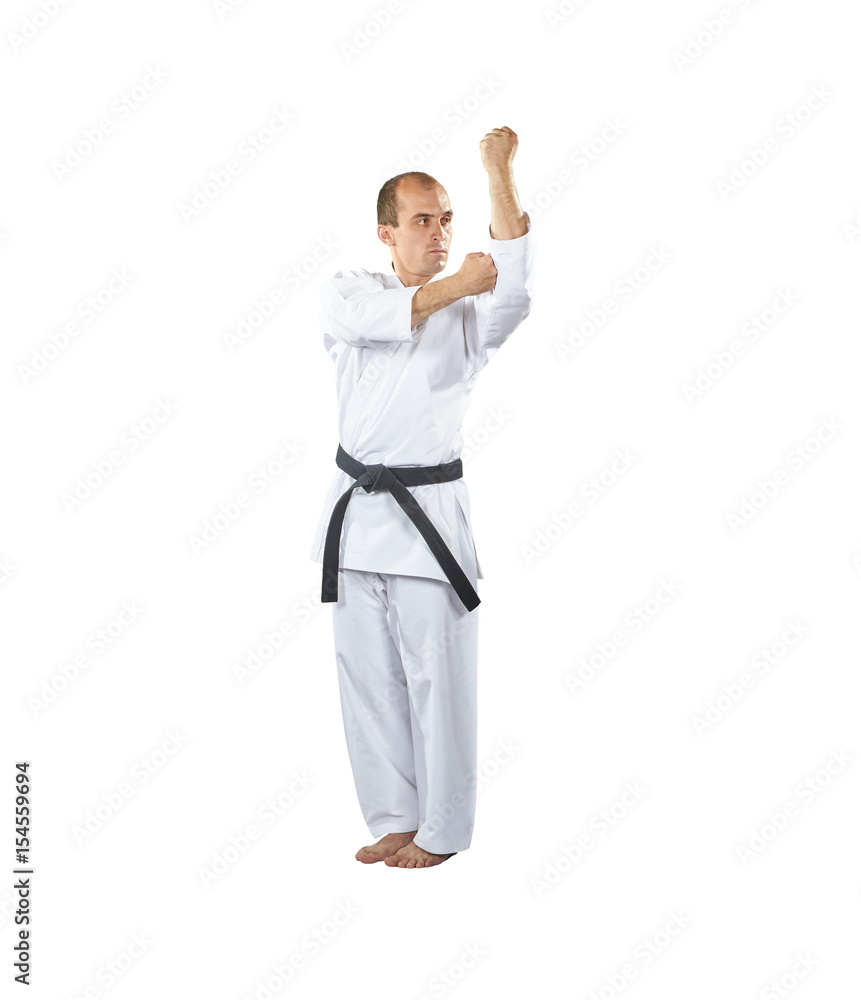 A man performs a block with both hands A man performs a block with both hands