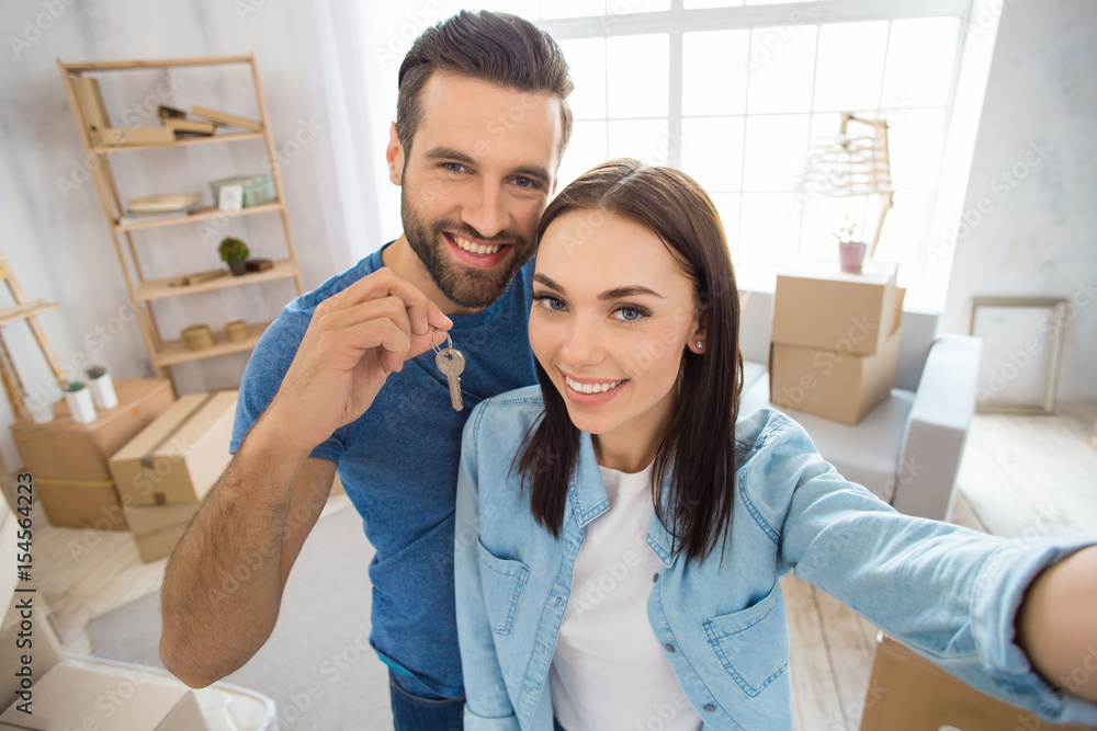 Young couple moving to a new apartment together relocation Young couple moving to a new apartment together relocation
