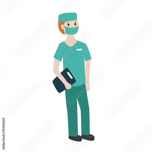 Young male surgeon in green gown