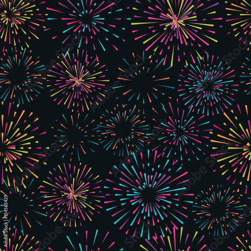 Vector seamless pattern with different colorful fireworks on dark background
